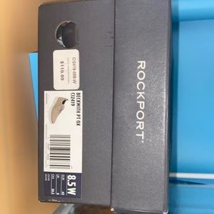 Rockport men’s size 8.5w boat shoes, never worn still in the box